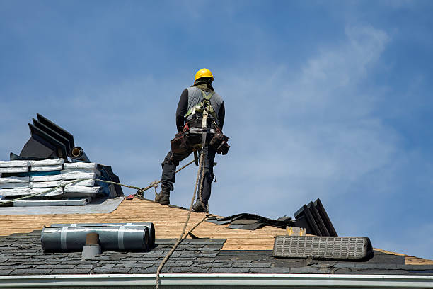 Professional Roof Replacement technician working in Milford, MA